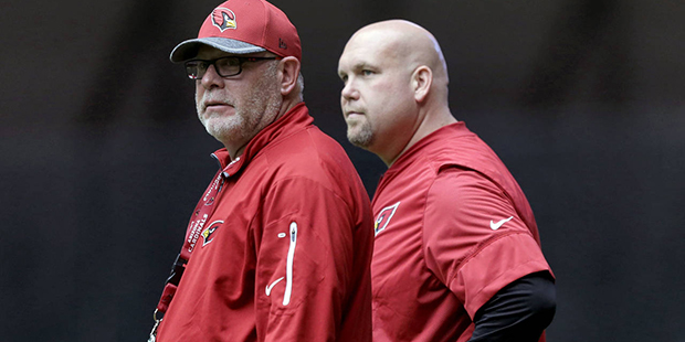 Arizona Cardinals head coach Bruce Arians, left, and general manager Steve Keim watch practice at t...