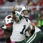 New York Jets quarterback Ryan Fitzpatrick (14) throws against the Arizona Cardinals during the second half of an NFL football game, Monday, Oct. 17, 2016, in Glendale, Ariz. (AP Photo/Ross D. Franklin)