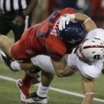 Arizona defensive lineman Parker Zellers (93) knocks the ball loose from Stanford running back Christian McCaffrey during the first half of an NCAA college football game, Saturday, Oct. 29, 2016, in Tucson, Ariz. (AP Photo/Rick Scuteri)