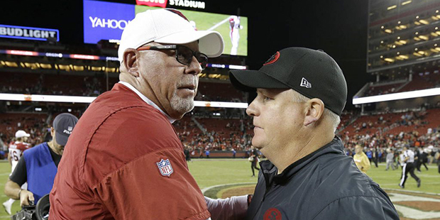 Arizona Cardinals coach Bruce Arians, left, greets San Francisco 49ers head coach Chip Kelly after ...