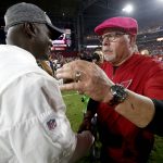 Arizona Cardinals head coach Bruce Arians, right, greets New York Jets head coach Todd Bowles after an NFL football game, Monday, Oct. 17, 2016, in Glendale, Ariz. The Cardinals won 28-3. (AP Photo/Ross D. Franklin)