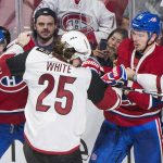 Montreal Canadiens' Alex Galchenyuk (27) and Alexei Emelin (74) brawl with Arizona Coyotes' Ryan White (25) and Brad Richardson during the second period of an NHL hockey game, Thursday, Oct. 20, 2016 in Montreal. (Graham Hughes/The Canadian Press via AP)