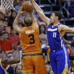 Phoenix Suns forward Jared Dudley (3) drives past Golden State Warriors guard Klay Thompson (11) during the first half of an NBA basketball game Sunday, Oct. 30, 2016, in Phoenix. (AP Photo/Ross D. Franklin)