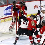 Ottawa Senators' Tom Pyatt (10) celebrates his goal against the Arizona Coyotes with teammates Ryan Dzingel, left, and Jean-Gabriel Pageau (44) during the first period of an NHL hockey game Tuesday, Oct. 18, 2016, in Ottawa, Ontario. (Fred Chartrand/The Canadian Press via AP)