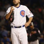 Chicago Cubs starting pitcher John Lackey pauses during the second inning of Game 4 of the Major League Baseball World Series against the Cleveland Indians, Saturday, Oct. 29, 2016, in Chicago. (AP Photo/Nam Y. Huh)