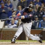 Cleveland Indians' Carlos Santana hits a home run during the second inning of Game 4 of the Major League Baseball World Series against the Chicago Cubs, Saturday, Oct. 29, 2016, in Chicago. (AP Photo/Nam Y. Huh)
