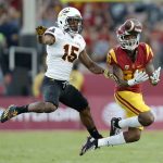 Southern California wide receiver Deontay Burnett (80) catches the ball against Arizona State defensive back Bryson Echols (15) during the first half of an NCAA college football game Saturday, Oct. 1, 2016, in Los Angeles. (AP Photo/Ryan Kang)