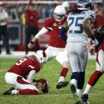 Arizona Cardinals kicker Chandler Catanzaro (7) kicks a field goal as punter Ryan Quigley (9) holds against the Seattle Seahawks during the first half of a football game, Sunday, Oct. 23, 2016, in Glendale, Ariz. (AP Photo/Ross D. Franklin)
