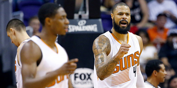Phoenix Suns' Tyson Chandler (4) reacts to a basket against the Minnesota Timberwolves during the f...
