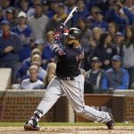 Cleveland Indians' Carlos Santana hits a home run during the second inning of Game 4 of the Major League Baseball World Series against the Chicago Cubs, Saturday, Oct. 29, 2016, in Chicago. (AP Photo/Nam Y. Huh)