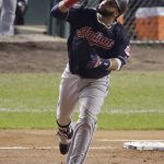 Cleveland Indians' Carlos Santana celebrates after a home run off Chicago Cubs starting pitcher John Lackey during the second inning of Game 4 of the Major League Baseball World Series Saturday, Oct. 29, 2016, in Chicago. (AP Photo/Charlie Riedel)