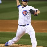 Chicago Cubs starting pitcher John Lackey throws during the first inning of Game 4 of the Major League Baseball World Series against the Cleveland Indians Saturday, Oct. 29, 2016, in Chicago. (AP Photo/Jerry Lai, Pool)