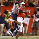 Arizona cornerback Jace Whittaker, left, breaks up a pass to Utah wide receiver Raelon Singleton during the first half of an NCAA college football game, Saturday, Oct. 8, 2016, in Salt Lake City. (AP Photo/George Frey)