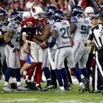 Arizona Cardinals wide receiver Michael Floyd (15) gets into a scuffle with the Seattle Seahawks during the second half of a football game, Sunday, Oct. 23, 2016, in Glendale, Ariz. (AP Photo/Ross D. Franklin)