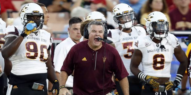Arizona State head coach Todd Graham yells during the first half of an NCAA college football game a...