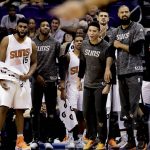 The Phoenix Suns bench reacts to a basket during the first half of an NBA preseason basketball game against the Dallas Mavericks, Friday, Oct. 14, 2016, in Phoenix. (AP Photo/Matt York)