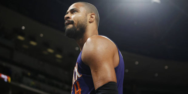 Phoenix Suns center Tyson Chandler walks off the court after being ejected for arguing with referee...