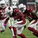 Arizona Cardinals defensive back D.J. Swearinger (36) celebrates his interception against the New York Jets with teammate Patrick Peterson (21) during the second half of an NFL football game, Monday, Oct. 17, 2016, in Glendale, Ariz. (AP Photo/Rick Scuteri)