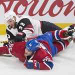 Arizona Coyotes' Alex Goligoski (33) collides with Montreal Canadiens' Andrew Shaw during the third period of an NHL hockey game, Thursday, Oct. 20, 2016 in Montreal. (Graham Hughes/The Canadian Press via AP)
