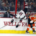 Arizona Coyotes' Anthony Duclair, left, cartwheels over Philadelphia Flyers' Sean Couturier during the first period of an NHL hockey game, Thursday, Oct. 27, 2016, in Philadelphia. (AP Photo/Tom Mihalek)