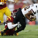 Arizona State wide receiver Tim White, right, is stopped by Southern California linebacker Michael Hutchings, left, during the first half of an NCAA college football game Saturday, Oct. 1, 2016, in Los Angeles. (AP Photo/Ryan Kang)