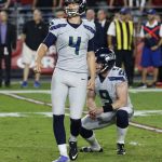 Seattle Seahawks kicker Stephen Hauschka (4) reacts to missing a game-winning field goal as punter Jon Ryan (9) looks on during overtime of an NFL football game against the Arizona Cardinals, Sunday, Oct. 23, 2016, in Glendale, Ariz. The game ended in overtime in a 6-6 tie. (AP Photo/Ross D. Franklin)