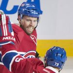 Montreal Canadiens' Shea Weber (6) celebrates with teammate Andrei Markov (79) after scoring against the Arizona Coyotes during the second period of an NHL hockey game, Thursday, Oct. 20, 2016 in Montreal. (Graham Hughes/The Canadian Press via AP)