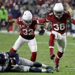 Arizona Cardinals defensive back D.J. Swearinger (36) celebrates his defensive stop after Seattle Seahawks running back C.J. Prosise (22) falls short of a first down during the second half of a football game, Sunday, Oct. 23, 2016, in Glendale, Ariz. (AP Photo/Rick Scuteri)