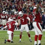 Arizona Cardinals kicker Chandler Catanzaro (7) celebrates his field goal with punter Ryan Quigley (9) during overtime of a football game against the Seattle Seahawks, Sunday, Oct. 23, 2016, in Glendale, Ariz. (AP Photo/Ross D. Franklin)