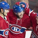 Montreal Canadiens' Alex Galchenyuk (27) celebrates with teammates Max Pacioretty (67) and Brendan Gallagher (11) after scoring against the Arizona Coyotes during the second period of an NHL hockey game, Thursday, Oct. 20, 2016 in Montreal. (Graham Hughes/The Canadian Press via AP)