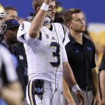 UCLA's injured Josh Rosen watches the game from the sidelines during the first half of an NCAA college football game against Arizona State on Saturday, Oct. 8, 2016, in Tempe, Ariz. (AP Photo/Ross D. Franklin)