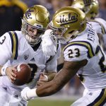 UCLA quarterback Josh Rosen (3) fakes a handoff to Nate Starks during the first half of an NCAA college football game against Arizona State on Saturday, Oct. 8, 2016, in Tempe, Ariz. (AP Photo/Ross D. Franklin)