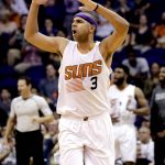 Phoenix Suns forward Jared Dudley reacts to making a 3-pointer during the first half of an NBA preseason basketball game against the Dallas Mavericks, Friday, Oct. 14, 2016, in Phoenix. (AP Photo/Matt York)