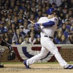 Chicago Cubs' Anthony Rizzo hits an RBI single during the first inning of Game 4 of the Major League Baseball World Series against the Cleveland Indians Saturday, Oct. 29, 2016, in Chicago. (AP Photo/David J. Phillip)