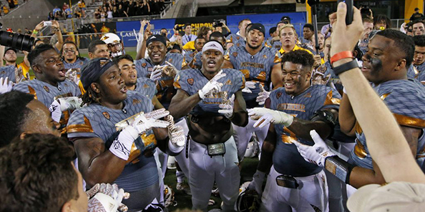 Arizona State players celebrate beating UCLA after an NCAA college football game Saturday, Oct. 8, ...