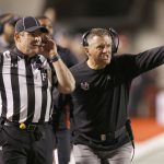 Utah coach Kyle Whittingham questions an official during the first half of an NCAA college football game against Arizona, Saturday, Oct. 8, 2016, in Salt Lake City. (AP Photo/George Frey)