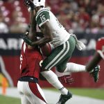 New York Jets wide receiver Brandon Marshall (15) makes the catch as Arizona Cardinals cornerback Patrick Peterson defends during the first half of an NFL football game, Monday, Oct. 17, 2016, in Glendale, Ariz. (AP Photo/Ross D. Franklin)