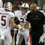 Stanford running back Christian McCaffrey (5) celebrates with Stanford coach David Shaw after scoring a touchdown during the first half of an NCAA college football game against Arizona, Saturday, Oct. 29, 2016, in Tucson, Ariz. (AP Photo/Rick Scuteri)