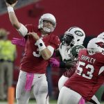 Arizona Cardinals quarterback Carson Palmer (3) is pressured by New York Jets defensive end Muhammad Wilkerson (96) during the first half of an NFL football game, Monday, Oct. 17, 2016, in Glendale, Ariz. (AP Photo/Rick Scuteri)