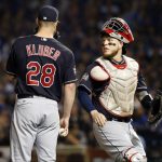 Cleveland Indians starting pitcher Corey Kluber (28) talks to catcher Roberto Perez during the first inning of Game 4 of the Major League Baseball World Series against the Chicago Cubs, Saturday, Oct. 29, 2016, in Chicago. (AP Photo/Nam Y. Huh)