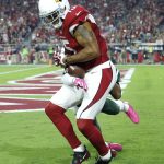 Arizona Cardinals wide receiver Michael Floyd (15) pulls in a touchdown pass as New York Jets cornerback Darryl Roberts defends during the second half of an NFL football game, Monday, Oct. 17, 2016, in Glendale, Ariz. (AP Photo/Ross D. Franklin)