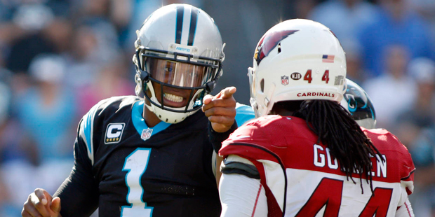 Carolina Panthers' Cam Newton (1) objects to a late hit by Arizona Cardinals' Markus Golden (44) in...