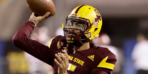 Arizona State quarterback Manny Wilkins (5) warms up for the team's NCAA college football game agai...