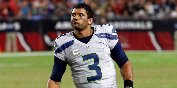 Seattle Seahawks quarterback Russell Wilson (3) reacts after a missed game-winning field goal attem...