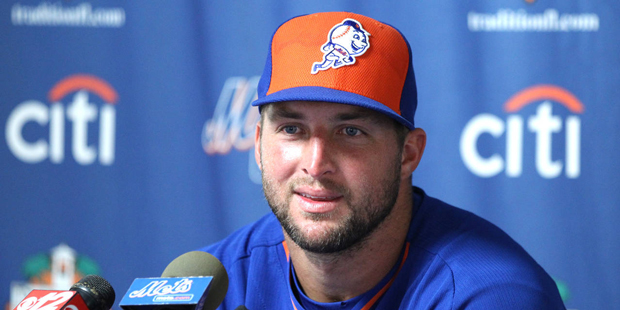 Tim Tebow talks during a press conference after his first instructional league baseball game for th...