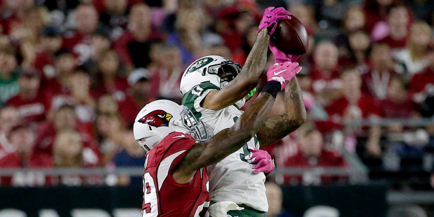 New York Jets wide receiver Robby Anderson (11) pulls in a catch as Arizona Cardinals cornerback Th...