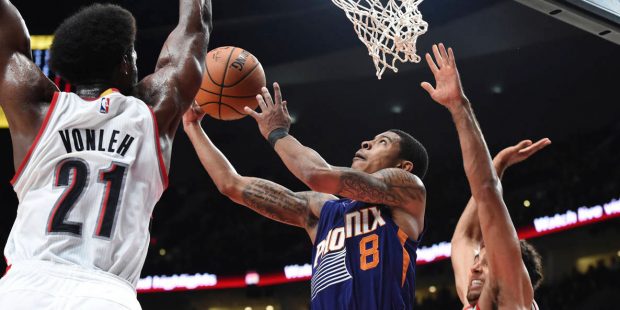 Phoenix Suns guard Tyler Ulis drives to the basket against Portland Trail Blazers forward Noah Vonl...
