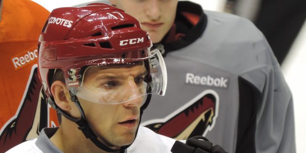Coyotes forward Radim Vrbata listens to the explanation of a drill during a team practice in the pr...