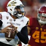 Arizona State quarterback Manny Wilkins (5) runs the football away from Southern California defensive end Porter Gustin (45) during the first half of an NCAA college football game Saturday, Oct. 1, 2016, in Los Angeles. (AP Photo/Ryan Kang)