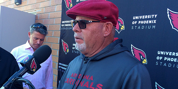 Cardinals coach Bruce Arians speaks to the media following practice Nov. 23. (Photo by Adam Green/A...
